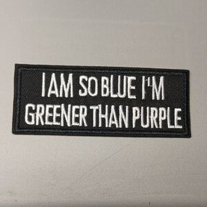 Black Patch with White Text